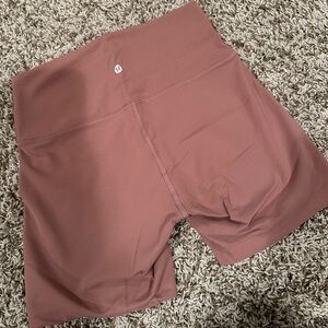 Coral pink lululemon biker shorts 8